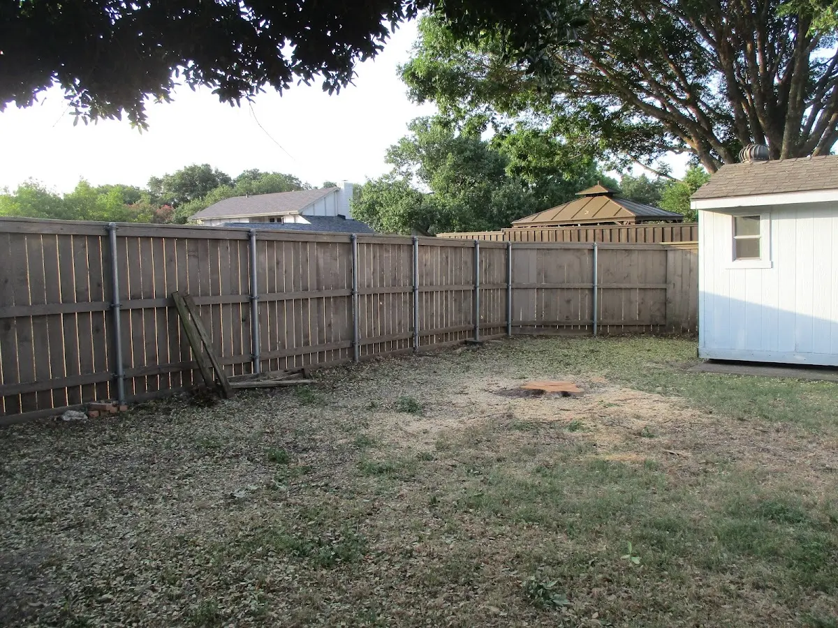 Cleared yard after professional tree removal in Oak Creek